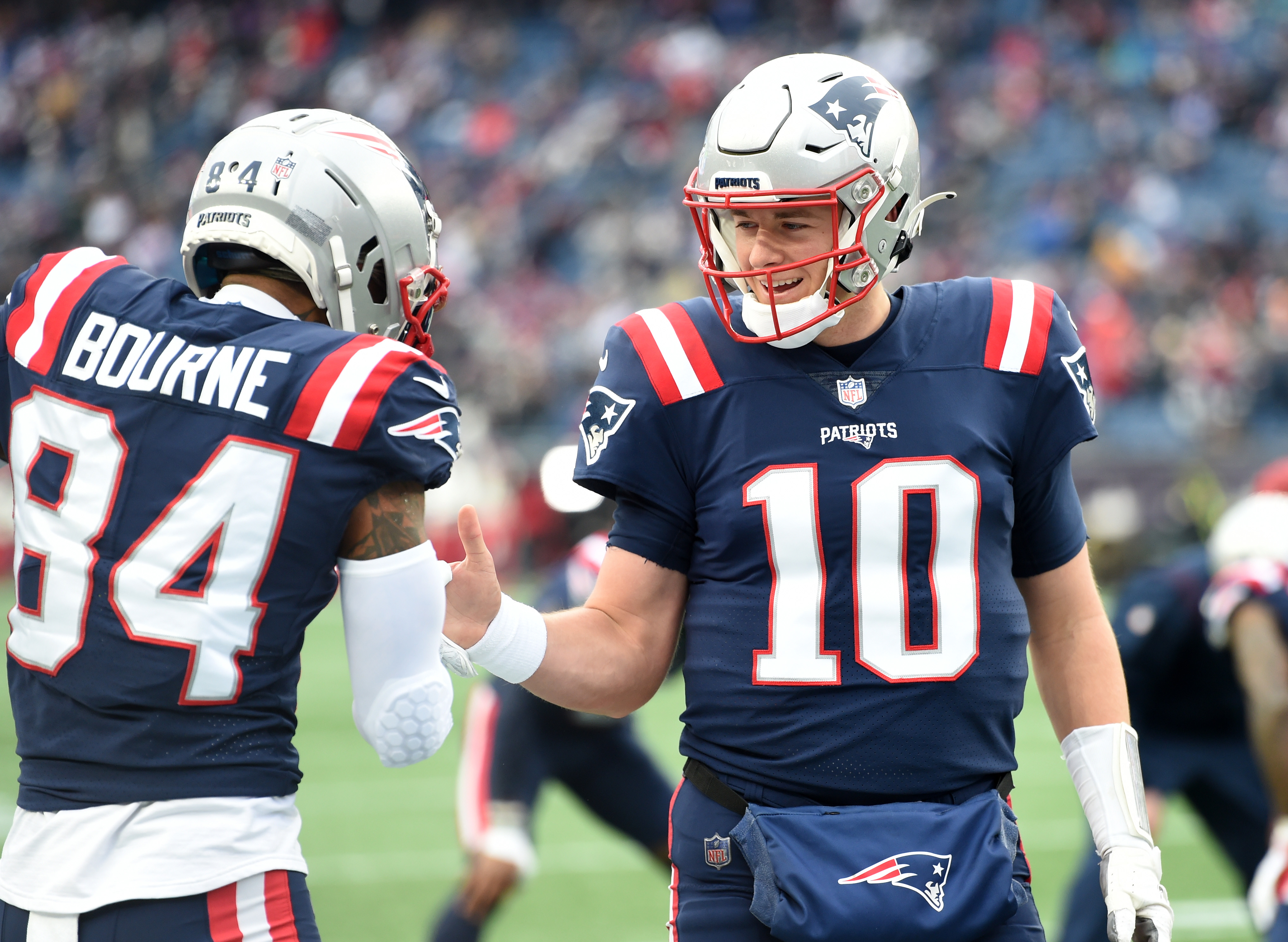 New England Patriots wide receiver Kendrick Bourne (84) and quarterback Mac Jones