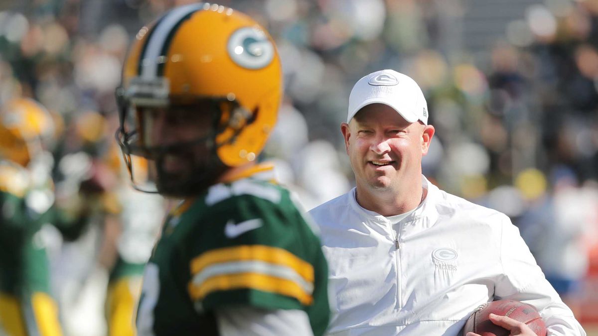 Green Bay Packers quarterback Aaron Rodgers and Denver Broncos head coach Nathaniel Hackett