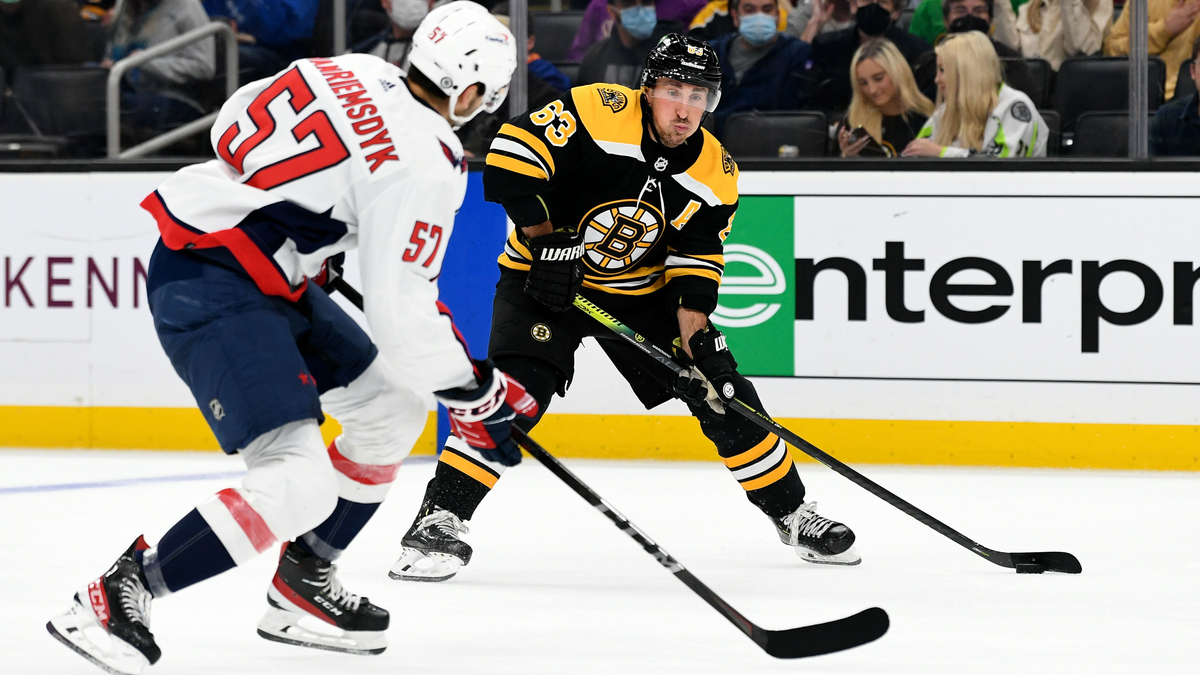 Boston Bruins winger Brad Marchand, Washington Capitals defenseman Trevor can Riemsdyk
