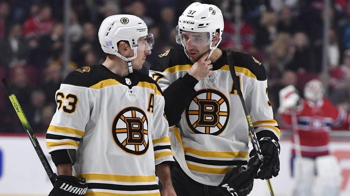 Boston Bruins forwards Brad Marchand, Patrice Bergeron
