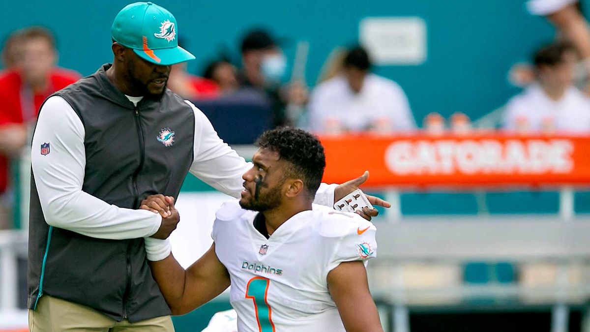 Former Miami Dolphins head coach Brian Flores and Dolphins quarterback Tua Tagovailoa