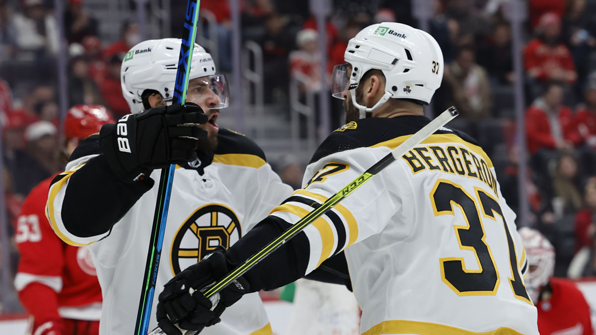 Boston Bruins forwards Craig Smith and Patrice Bergeron