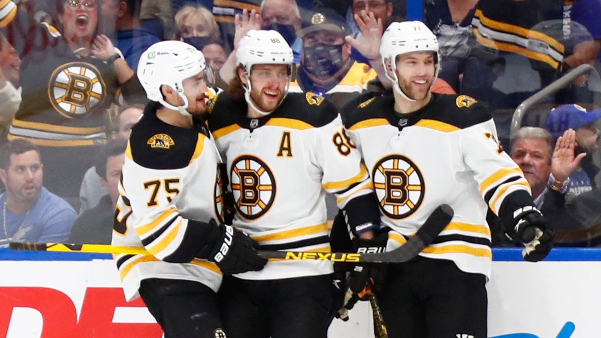 Boston Bruins' David Pastrnak, Taylor Hall, Connor Clifton