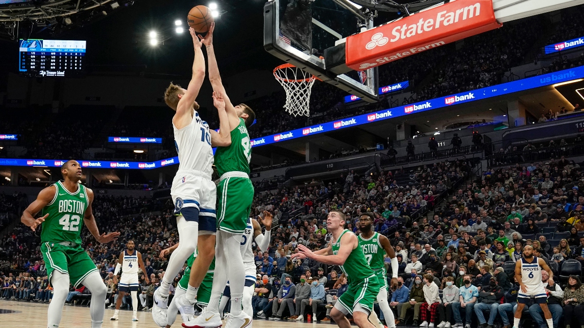 Boston Celtics forward Juancho Hernangomez (41) and Minnesota Timberwolves forward Jake Layman (10)