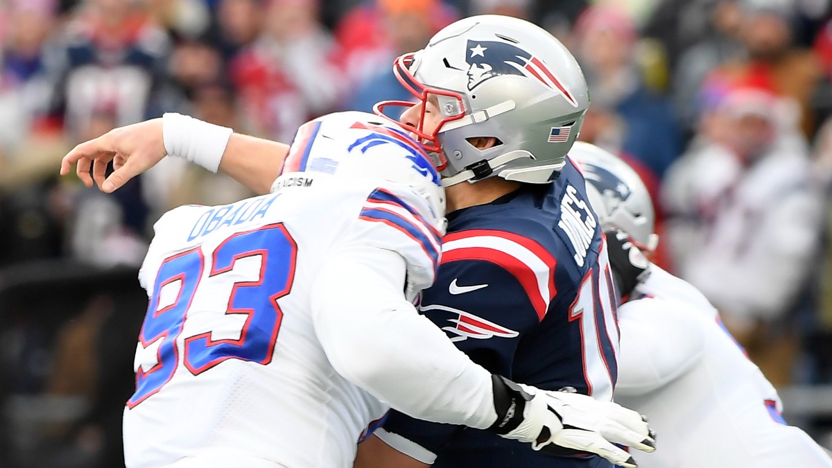 Buffalo Bills defensive end Efe Obada, New England Patriots quarterback Mac Jones