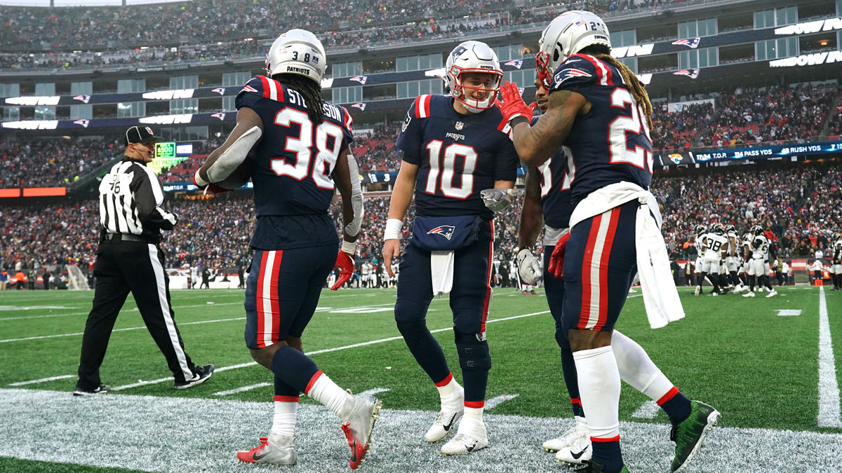 New England Patriots quarterback Mac Jones and running back Brandon Bolden