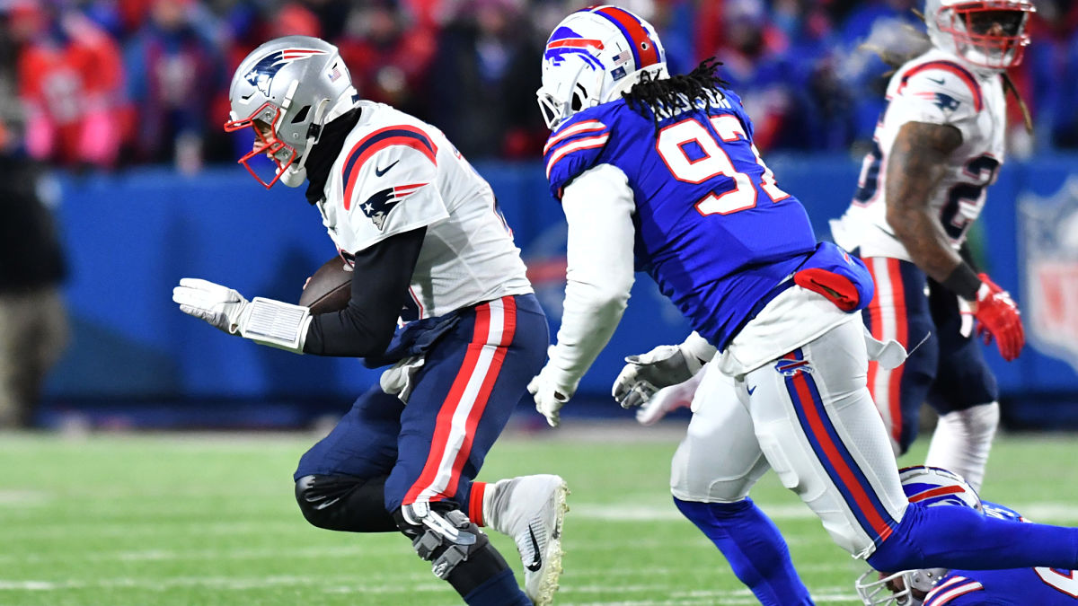 New England Patriots quarterback Mac Jones and Buffalo Bills defensive end Mario Addison