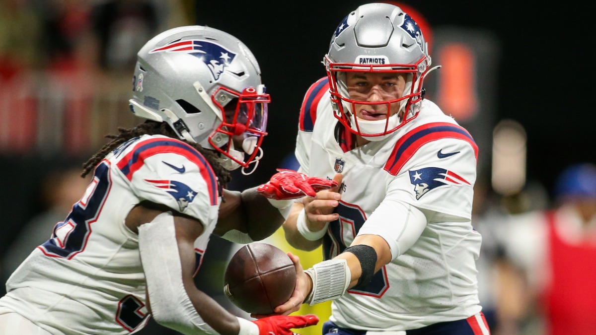 New England Patriots running back Rhamondre Stevenson, quarterback Mac Jones