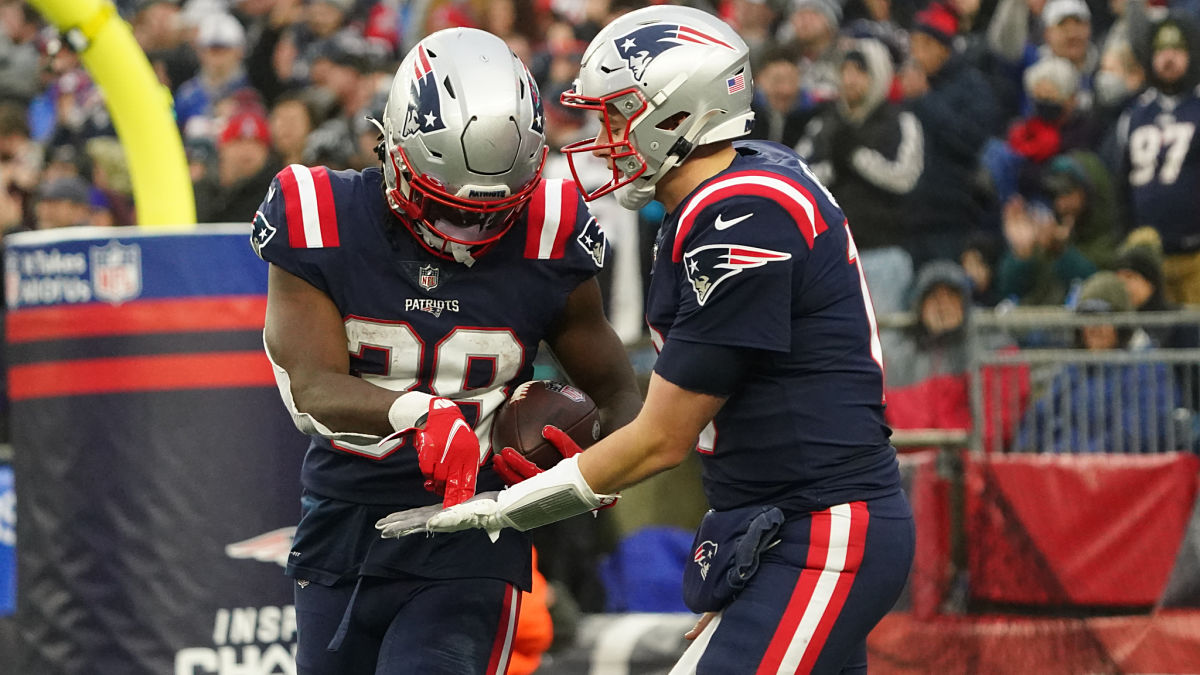 New England Patriots running back Rhamondre Stevenson and quarterback Mac Jones