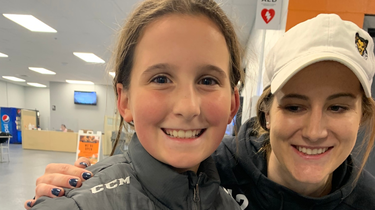 Robyn Bolger and Boston Pride player Mallory Souliotis (left)