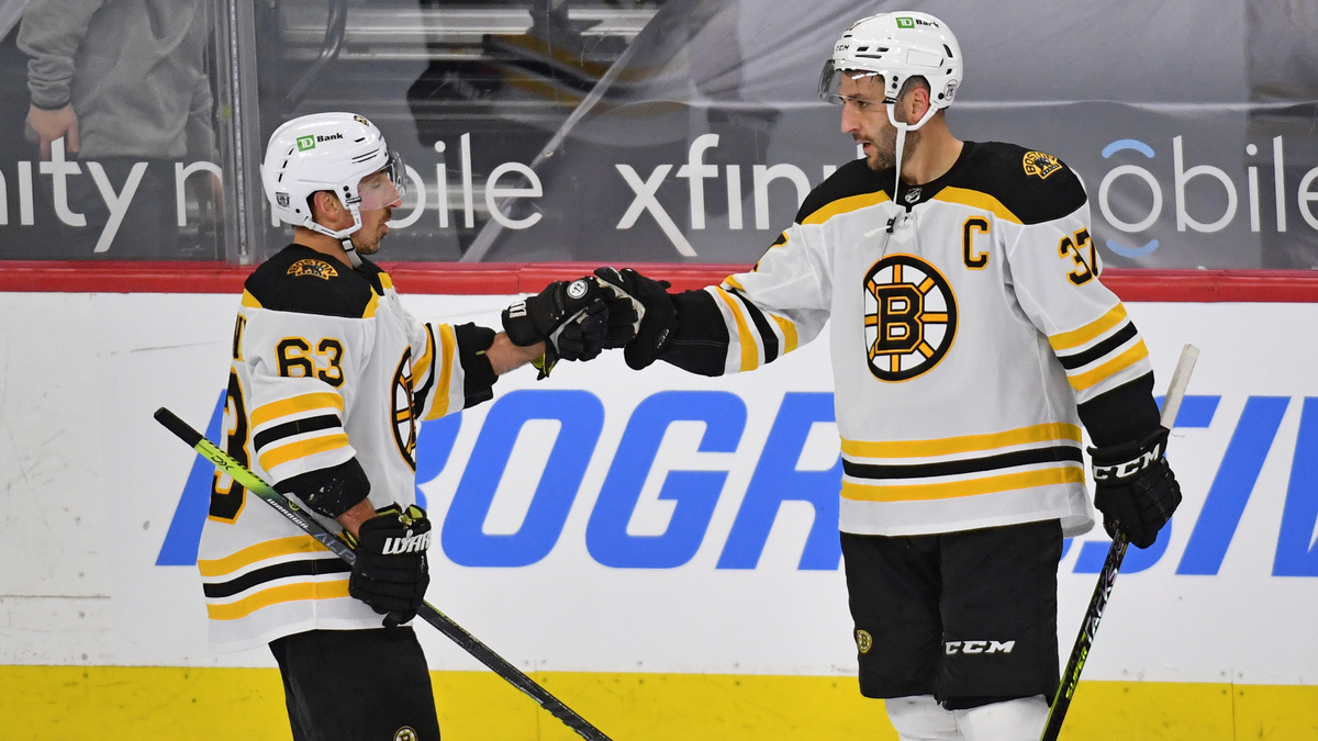 Boston Bruins forward Brad Marchand, center Patrice Bergeron
