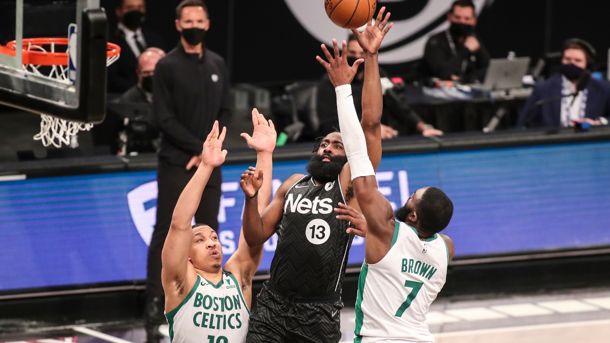 Brooklyn Nets guard James Harden (13), Boston Celtics forward Grant Williams (12) and guard Jaylen Brown (7)