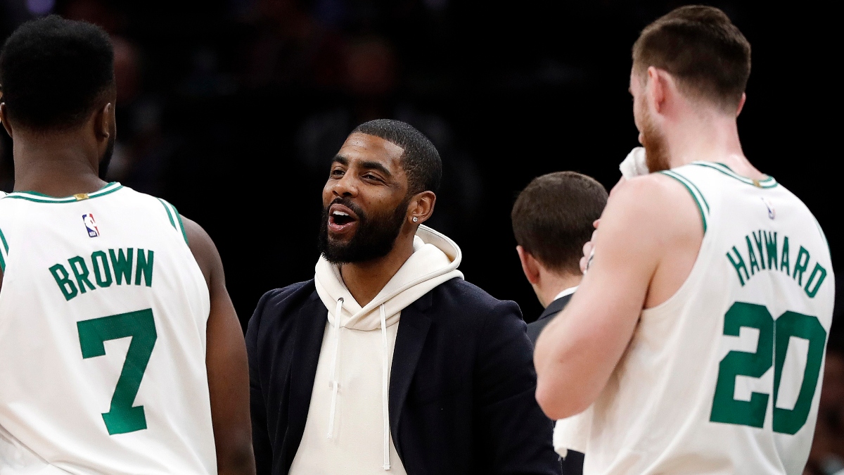 Boston Celtics forward Jaylen Brown (7) and NBA guard Kyrie Irving (center) and forward Gordon Hayward (right)