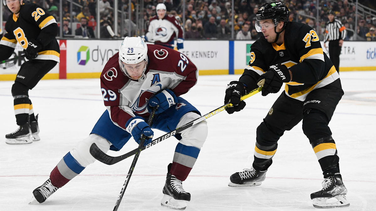 Boston Bruins defenseman Charlie McAvoy, Colorado Avalanche center Nathan MacKinnon