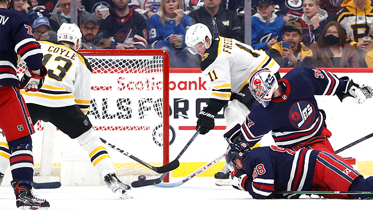 Boston Bruins Trent Frederic and Charlie Coyle