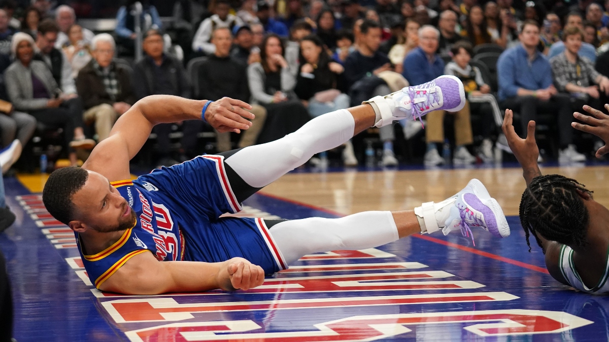 Golden State Warriors guard Stephen Curry (30) and Boston Celtics guard Marcus Smart (36)