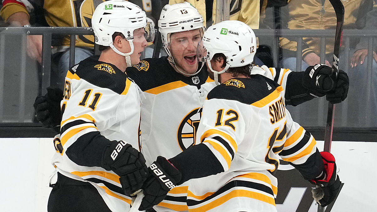 Boston Bruins Craig Smith, Trent Frederic, Charlie Coyle