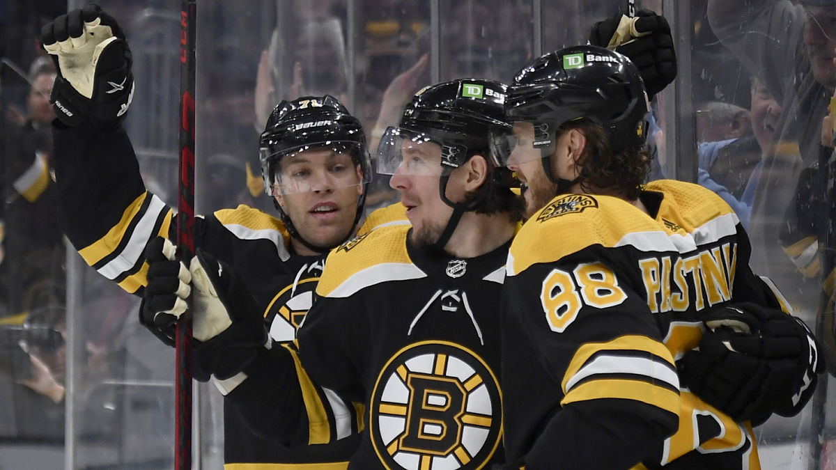 Boston Bruins forwards Taylor Hall, Erik Haula, David Pastrnak