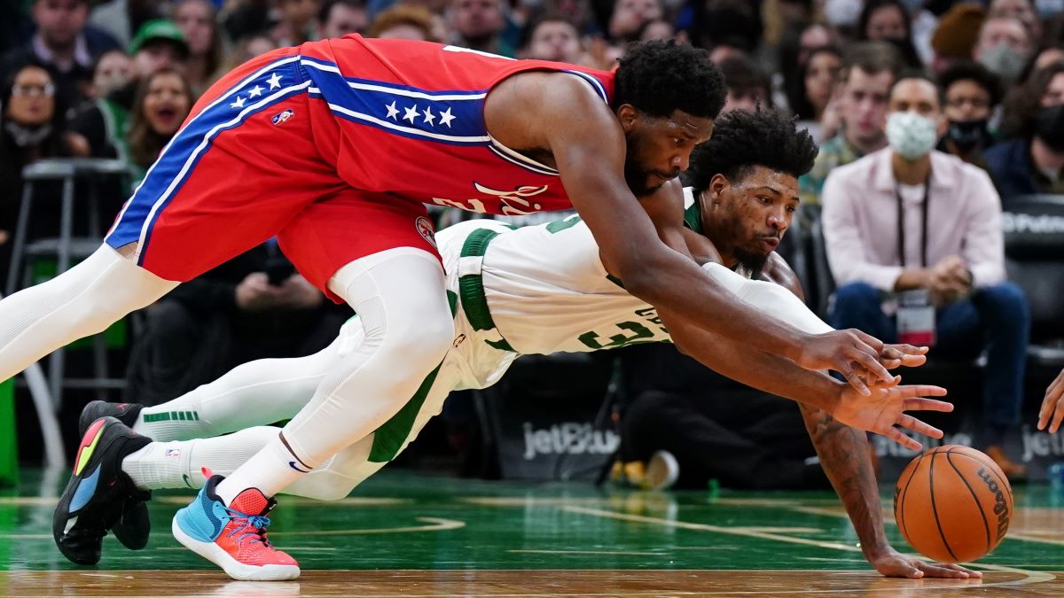 Boston Celtics guard Marcus Smart and Philadelphia 76ers center Joel Embiid