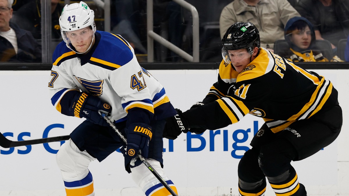 St. Louis Blues defenseman Torey Krug, Boston Bruins center Trent Frederic
