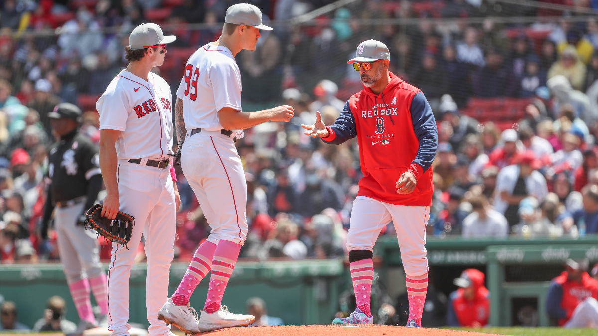 Boston Red Sox pitcher Tanner Houck and manager Alex Cora