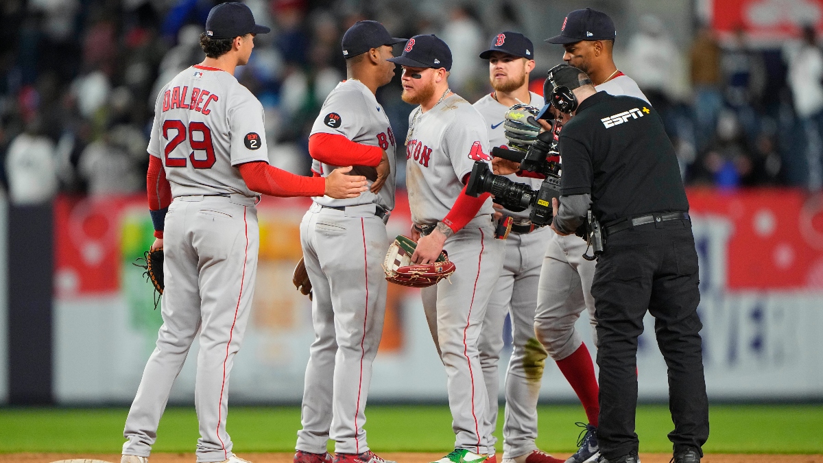 Red Sox first baseman Bobby Dalbec (29), left fielder Alex Verdugo (99) and teammates