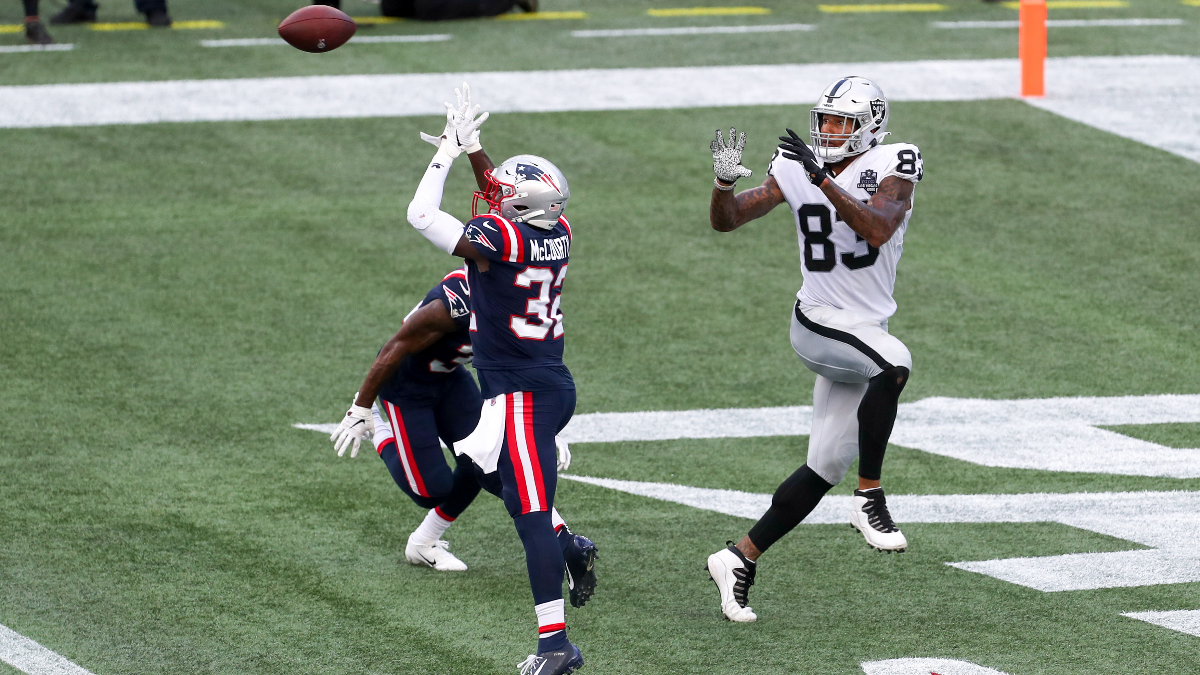New England Patriots safety Devin McCourty and Las Vegas Raiders tight end Darren Waller