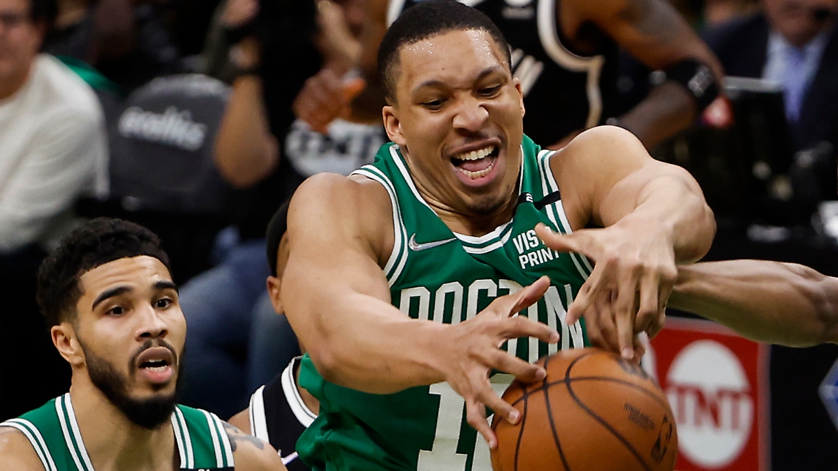 Boston Celtics forwards Grant Williams (12) and Jayson Tatum (0)