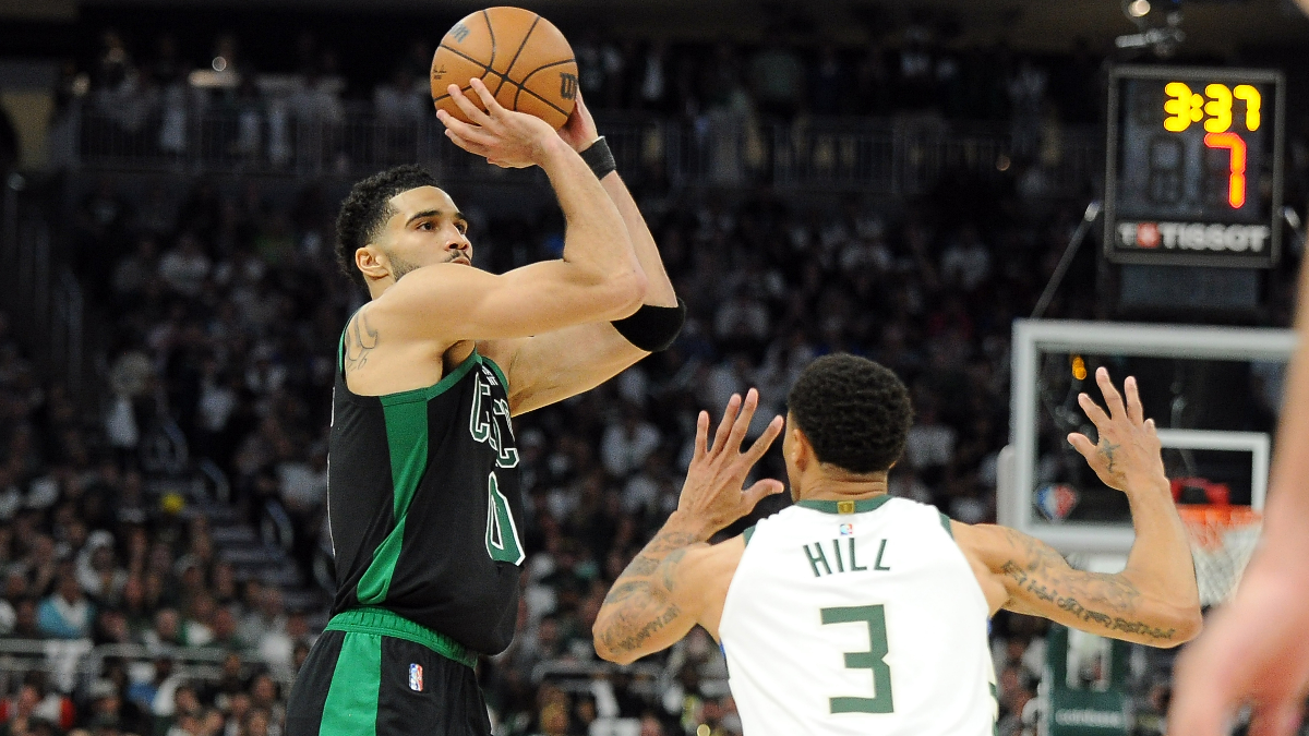 Boston Celtics forward Jayson Tatum and Milwaukee Bucks guard George Hill