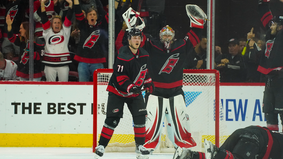 Carolina Hurricanes right wing Jesper Fast and goalie Antti Raanta