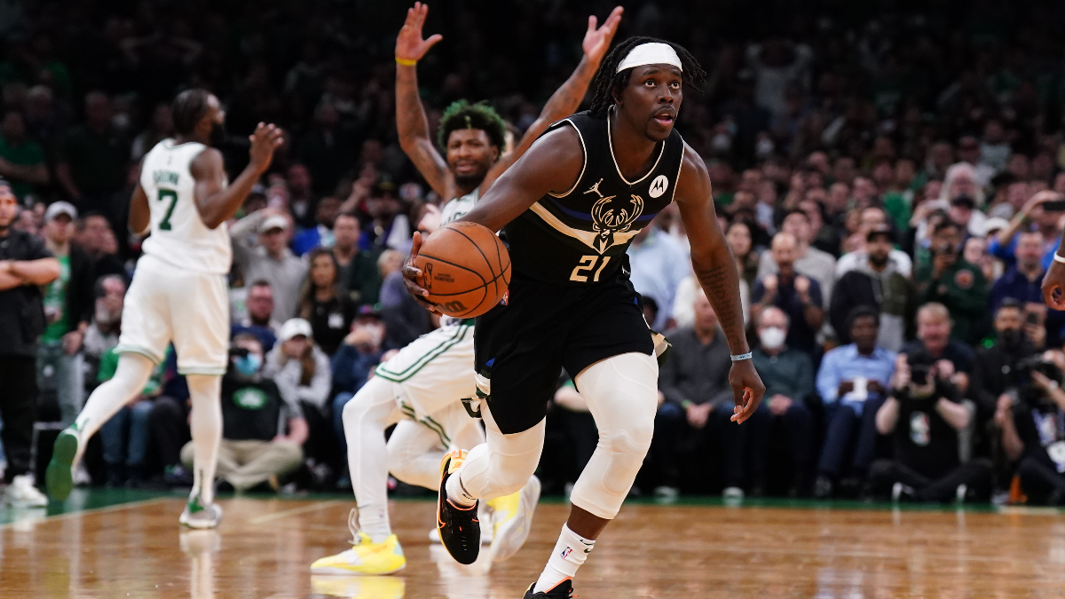 Boston Celtics guard Marcus Smart and Milwaukee Bucks guard Jrue Holiday