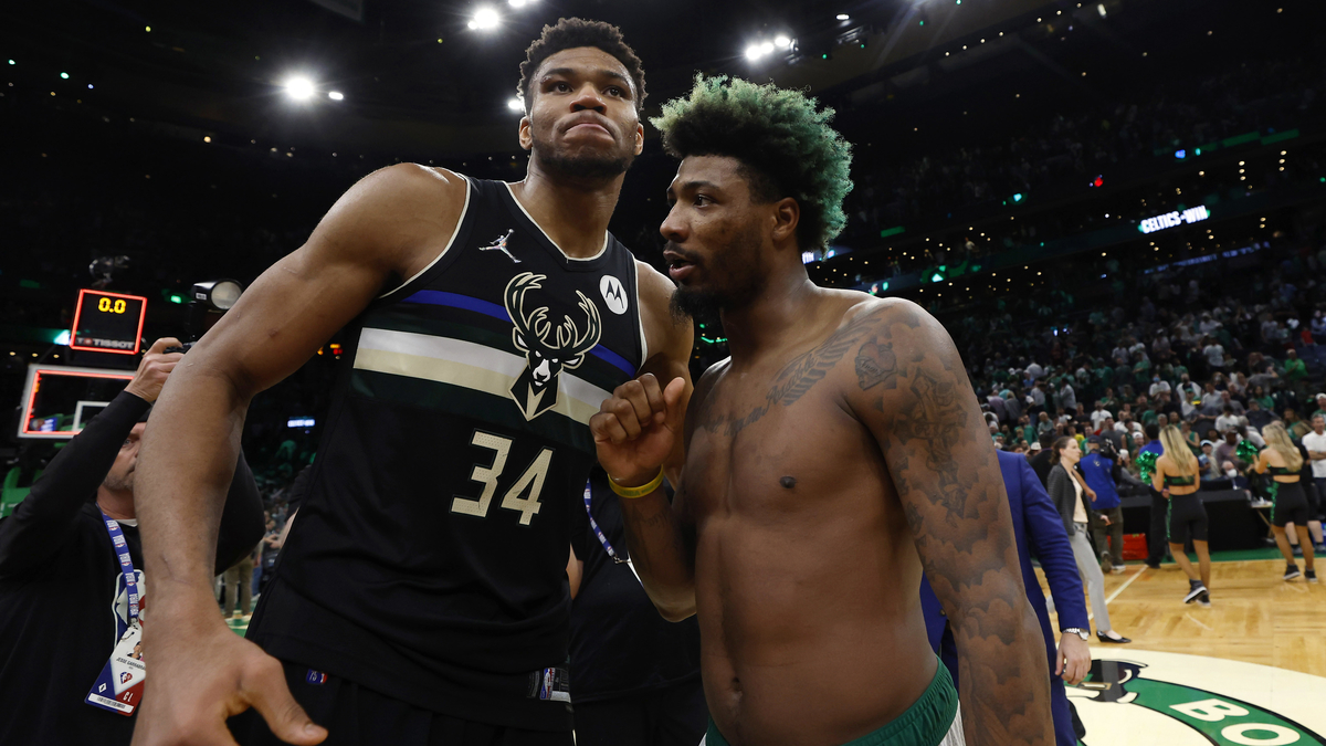 Boston Celtics guard Marcus Smart and Milwaukee Bucks forward Giannis Antetokounmpo
