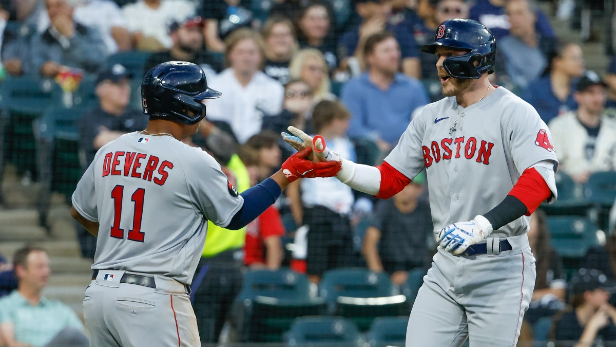 Boston Red Sox infielders Rafael Devers, Trevor Story