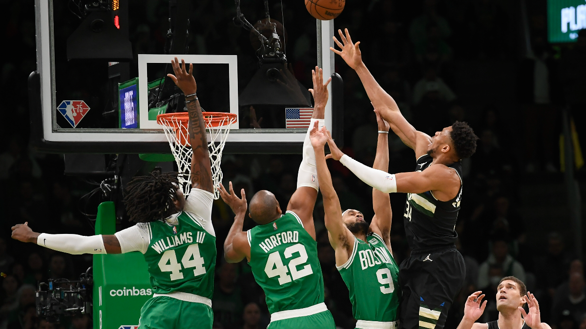 Boston Celtics forwards Robert Williams III and Al Horford and guard Derrick White