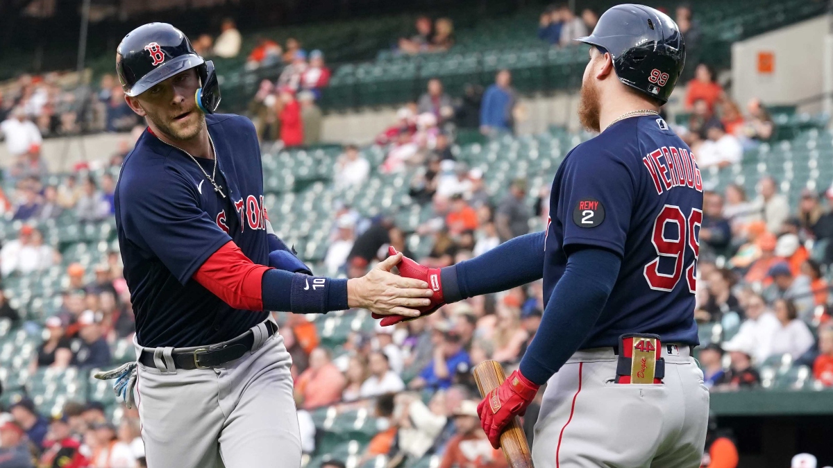 Boston Red Sox second baseman Trevor Story (10) and outfielder Alex Verdugo (99)