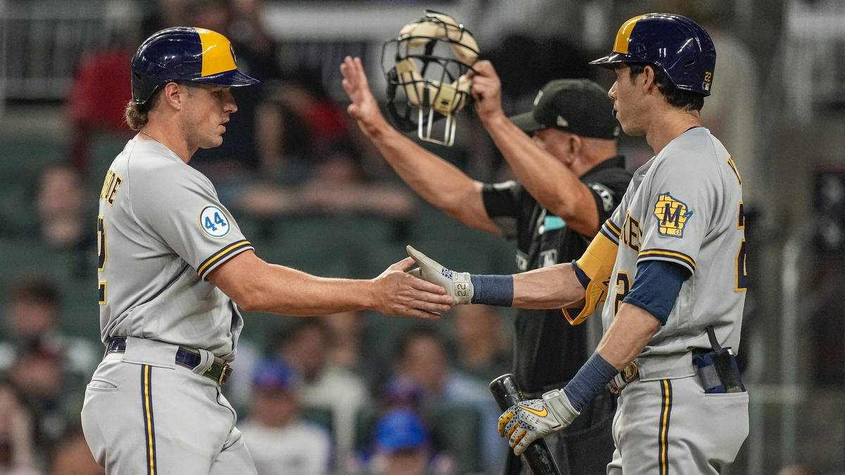 Milwaukee Brewers players Hunter Renfroe, Christian Yelich