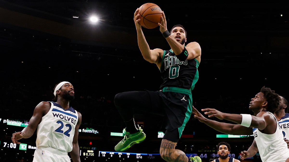 Boston Celtics forward Jayson Tatum (0), Minnesota Timberwolves guard Patrick Beverley (22), forward Anthony Edwards (1)