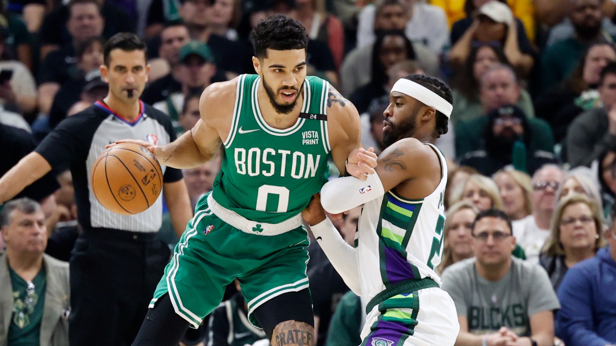 Boston Celtics forward Jayson Tatum (0), Milwaukee Bucks guard Wesley Matthews (23)