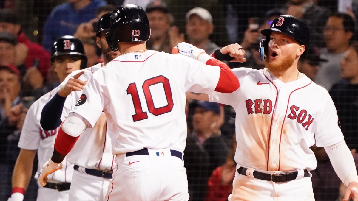 Boston Red Sox second baseman Trevor Story (10), designated hitter J.D. Martinez and left fielder Alex Verdugo