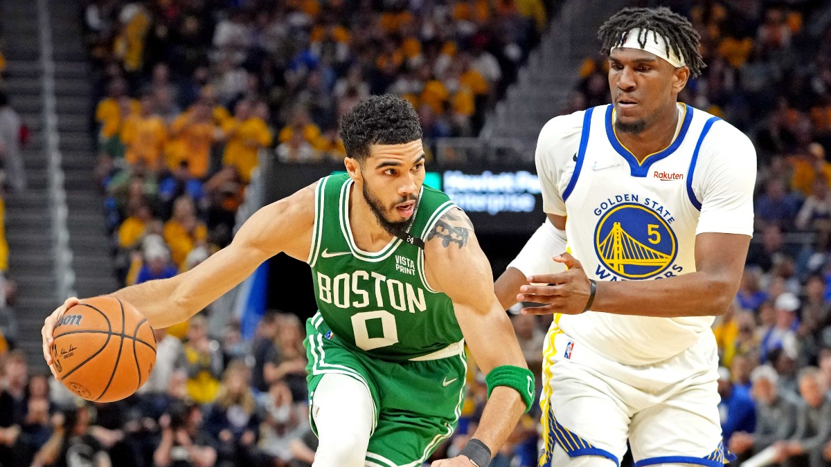 Boston Celtics forward Jayson Tatum, Golden State Warriors center Kevon Looney