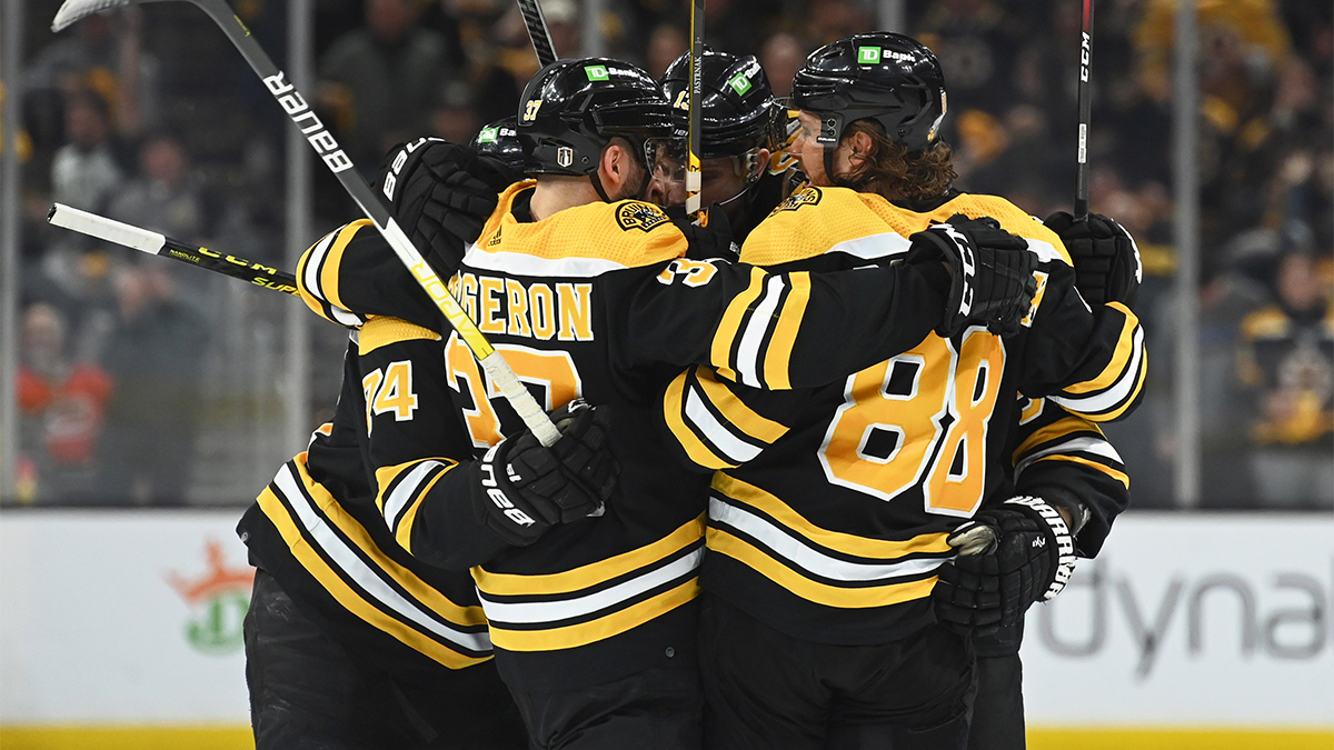 Boston bruins forwards David Pastrnak and Patrice Bergeron
