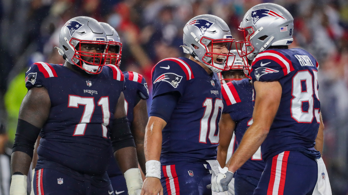 New England Patriots Michael Onwenu, Mac Jones and Hunter Henry