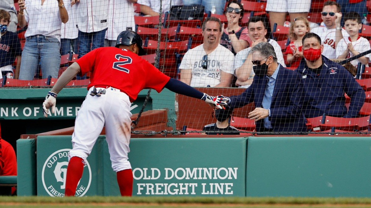 Boston Red Sox shortstop Xander Bogaerts, principal owner John Henry