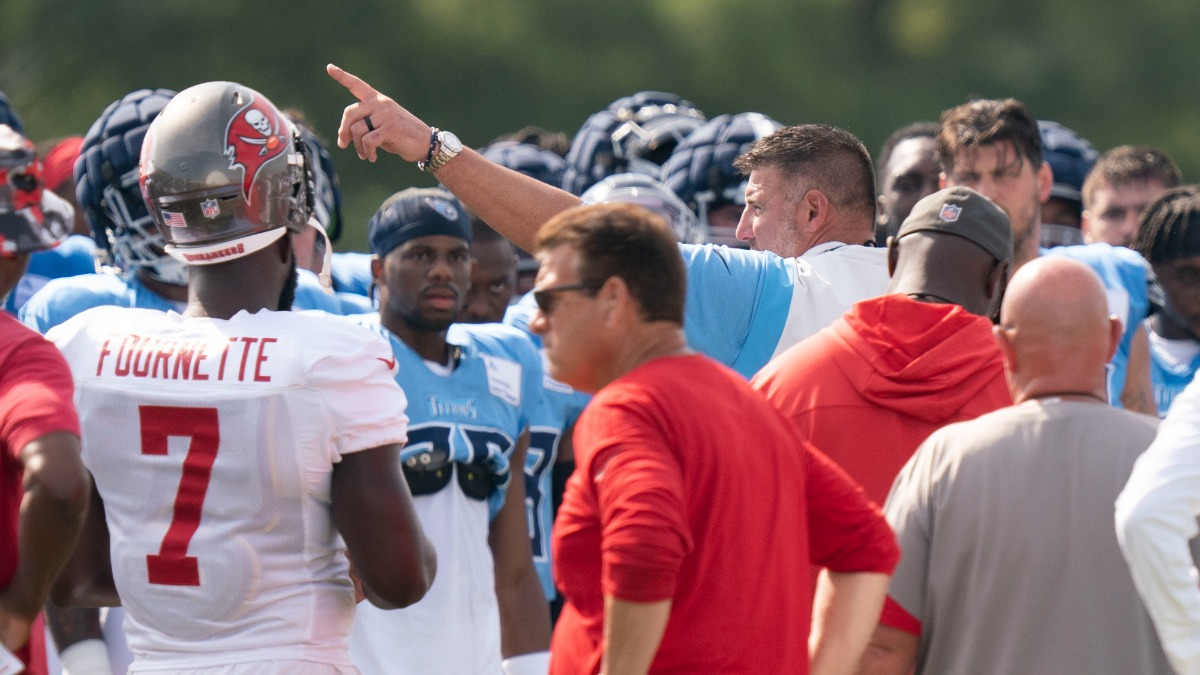 Tampa Bay Buccaneers running back Leonard Fournette, Tennessee Titans head coach Mike Vrabel