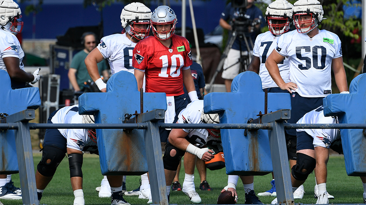 New England Patriots quarterback Mac Jones and lineman Cole Strange