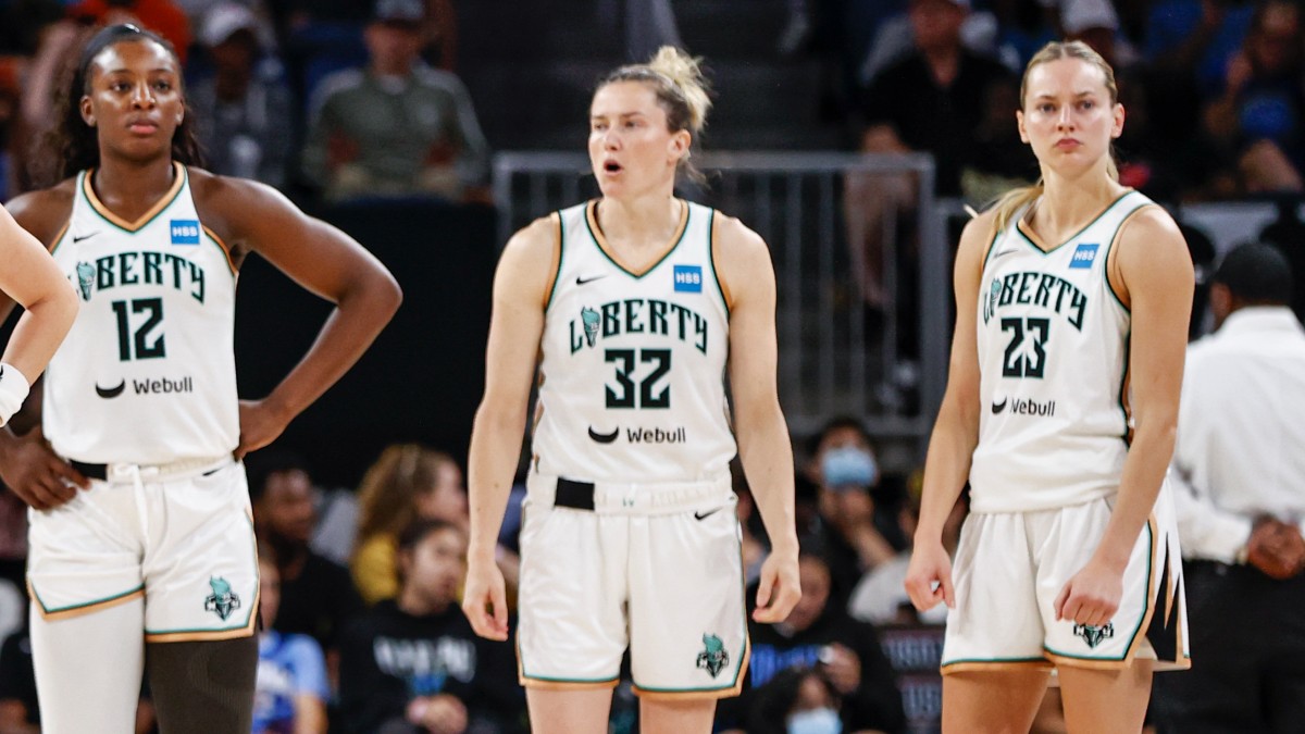 New York Liberty forward Michaela Onyenwere (12), guard Sami Whitcomb (32) and guard Marine Johannès (23)