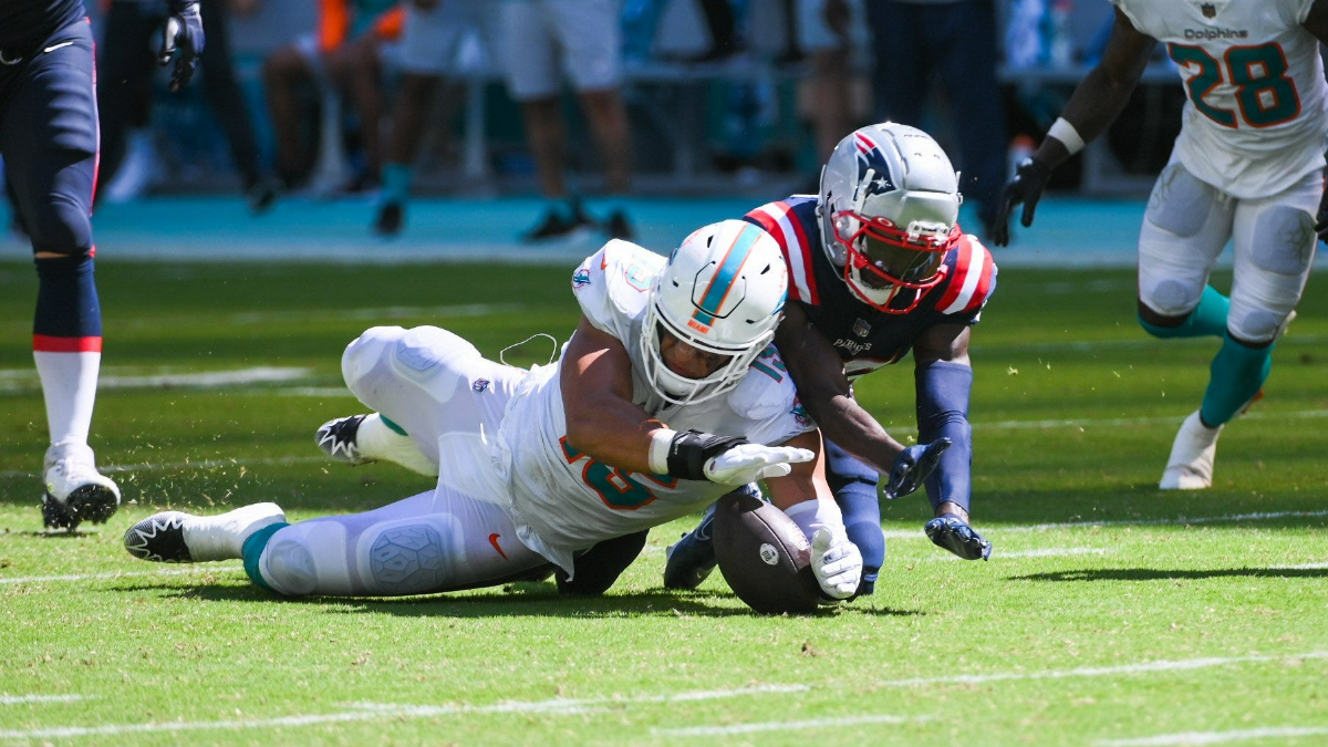 Miami Dolphins linebacker Jaelan Phillips and New England Patriots wide receiver Nelson Agholor