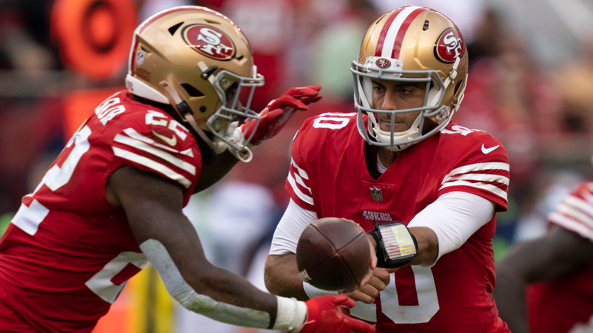 San Francisco 49ers running back Jeff Wilson Jr. and quarterback Jimmy Garoppolo