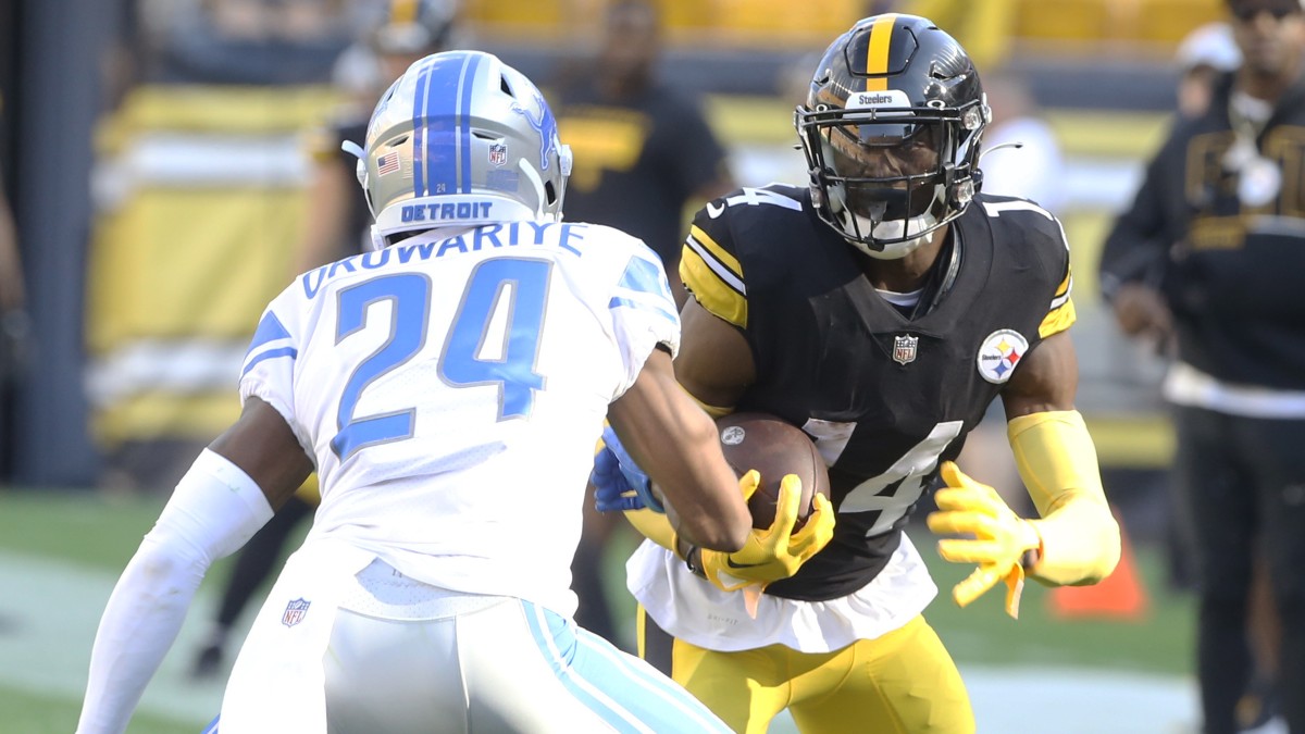 Pittsburgh Steelers wide receiver George Pickens (14), Detroit Lions cornerback Amani Oruwariye (24)