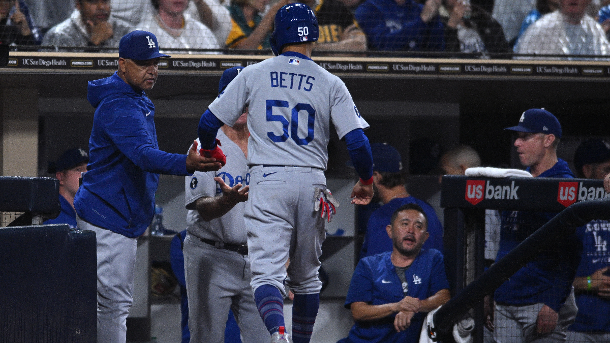 Los Angeles Dodgers manager Dave Roberts and outfielder Mookie Betts